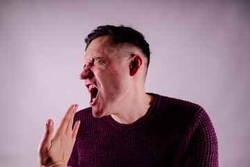 Crop person slapping scared man in face. Emotional male getting slapped in face while shouting with...