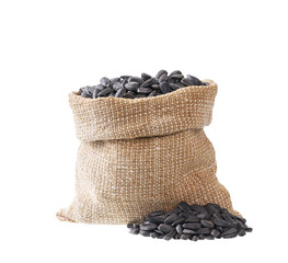 sunflowers seeds in a sack isolated on a white background with clipping path.
