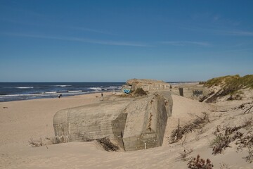 Obraz premium bunker ruin at beach near Houvig, Jutland, Denmark, ocean in background