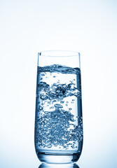 water glass on blue background