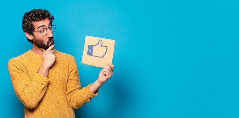 young crazy bearded man with a social media like banner
