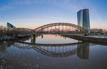 Aerial panoramic picture of Deutschherrnbrücke with Frankfurt skyline during sunrise