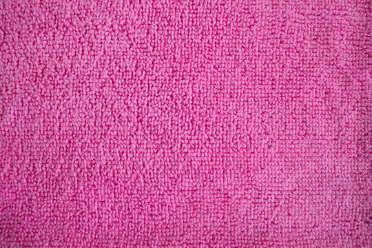 Bright pink towel, closeup fabric texture, cozy domestic