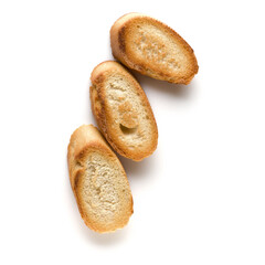 Toasted baguette slices isolated on white background close up.  Toast, crouton.   Top view.