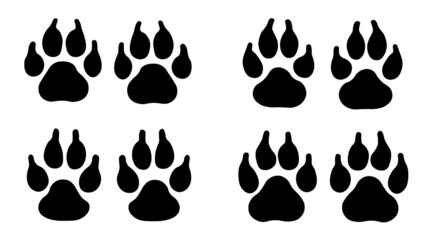 Fototapeta premium A set of 4 pairs of different shaped paw prints.