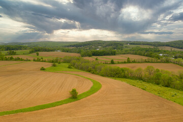 Aerial view of a farm plowed and ready for planting.