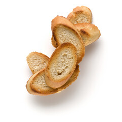 Toasted baguette slices isolated on white background close up.  Toast, crouton.   Top view.