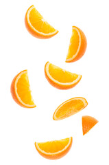 falling fresh orange fruit slices isolated on white background closeup. Flying food concept. Top view. Flat lay. Orange slice in air, without shadow.