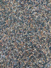 Background from small pebbles, abstract background for an inscription, banner and design.