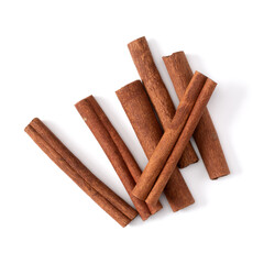 Cinnamon sticks isolated on white background closeup. Canella spice. Aromatic condiment background. Flat lay, top view.