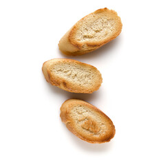 Fototapeta na wymiar Toasted baguette slices isolated on white background close up. Toast, crouton. Top view.