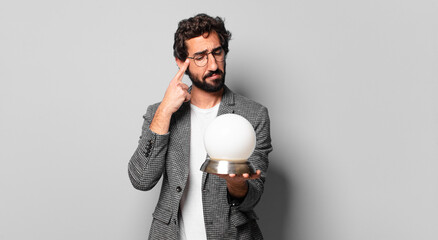 young crazy bearded businessman. future teller