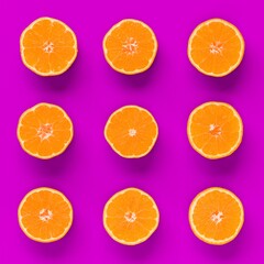 Fruit pattern of fresh orange tangerine or mandarin on lilac background. Flat lay, top view. Pop art design, creative summer concept. Citrus in minimal style.
