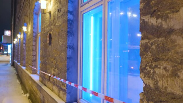 The glass window of the house with the cordon on a winter season