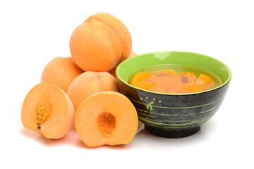 peaches in syrup on a white background 