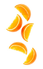 falling fresh orange fruit slices isolated on white background closeup. Flying food concept. Top view. Flat lay. Orange slice in air, without shadow.