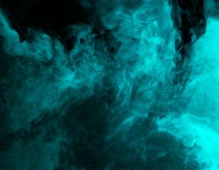 Abstract background of chaotically mixing clouds of turquoise smoke on a background of darkness