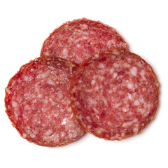 Slices of salami isolated on white background closeup. Sausage top view.