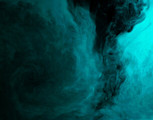 Abstract background of chaotically mixing clouds of turquoise smoke on a background of darkness