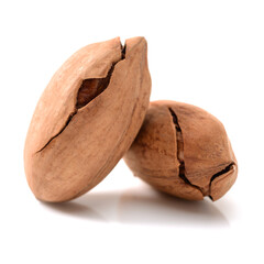 Peeled pecan nuts closeup, isolated on white background