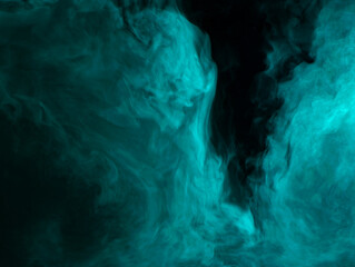 Abstract background of chaotically mixing clouds of turquoise smoke on a background of darkness