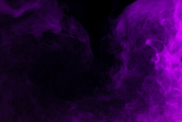 Fototapeta na wymiar Abstract background of chaotically mixing puffs of purple smoke on a dark background