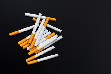 Cigarette on dark background. Non smoking for health concept