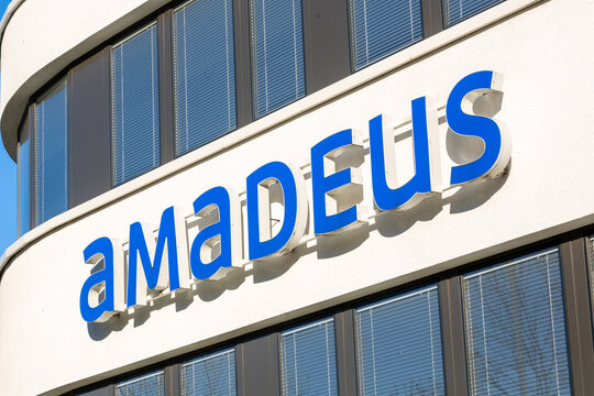 company building facade with logo of amadeus with blue lettering in bad homburg, Germany taken on 13.02.2021