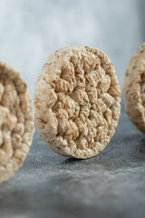 Crunchy rice cakes on marble wooden background
