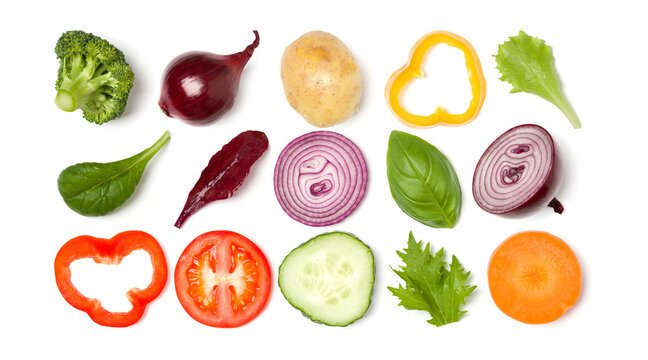 Creative layout made of tomato slice, onion, cucumber, basil leaves. Flat lay, top view. Food concept. Vegetables isolated on white background. Food ingredient pattern.