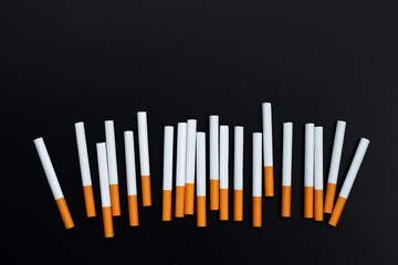Cigarette on dark background. Non smoking for health concept