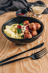 Swedish meatballs with mashed potatoes, gravy and lingonberry jam