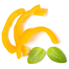 Naklejka na ściany i meble Yellow pepper slices with basil leaves isolated on white background cutout. Top view, flat lay.
