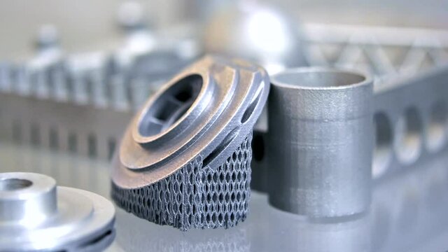 Model with supports printed in laser sintering machine. DMLS, SLM, SLS technology. Modern 3D printer printing from metal powder. 4.0 industrial revolution. Progressive additive technology 3D printing
