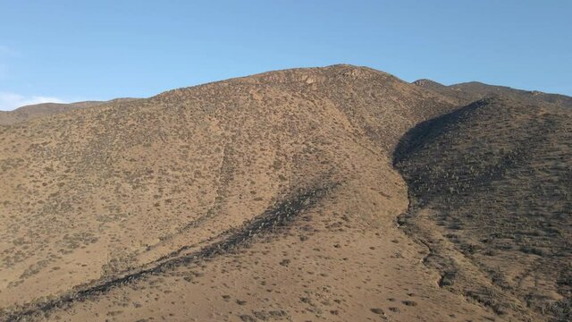 Drone aerial view, el manzano sector, coquimbo, chile. Mountain, desert with clear sky. 4k