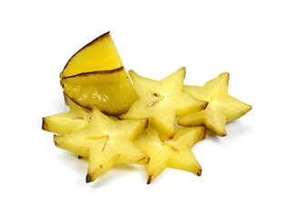 Naklejka premium Star shaped slices of carambola fruit isolated on white background. Carambola fruit with slice of star fruit isolated on a white background.