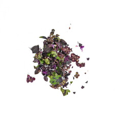 Fresh chopped red basil flower and leaves isolated on white background. Spicy aromatic sliced raw basilic or ocimum herbs. 
