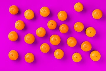 Fruit pattern of fresh orange tangerine or mandarin on lilac background. Flat lay, top view. Pop art design, creative summer concept. Citrus in minimal style.