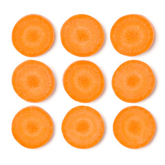 Creative layout made of carrot slices. Flat lay, top view. Vegetables isolated over white background. Food ingredient pattern.