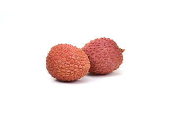 Lychee with leaves isolated on white background. Tropical fruit