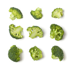 Creative layout made of broccoli. Flat lay, top view. Vegetables isolated on white background. Food ingredient pattern..