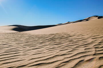 Sand dunes agains the blue sky. Nature landscape. National park, Great Sand Dunes Colorado