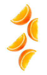 falling fresh orange fruit slices isolated on white background closeup. Flying food concept. Top view. Flat lay. Orange slice in air, without shadow.