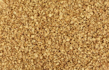 Buckwheat flakes isolated on white background. Healthy buckwheat flakes. Healthy food.