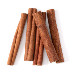 Cinnamon sticks isolated over white background closeup. Canella spice. Aromatic condiment background. Flat lay, top view..