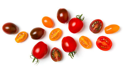 various colorful tomatoes isolated over white background. Top view, flat lay. Creative layout..