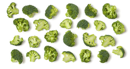 Creative layout made of broccoli. Flat lay, top view. Vegetables isolated over white background. Food ingredient pattern..