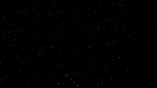 Atmospheric dust particles isolated on black background. Place it over your footage in screen or add mode.