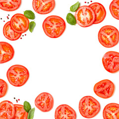 Creative layout made of tomato slices and basil leaves. Flat lay, top view. Food concept. Vegetables isolated on white background. Food ingredients pattern with copy space.