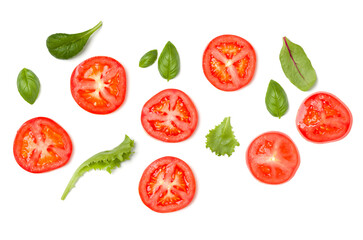 Creative layout made of tomato slices and lettuce salad leaves. Flat lay, top view. Food concept. Vegetables isolated on white background. Food ingredients pattern.